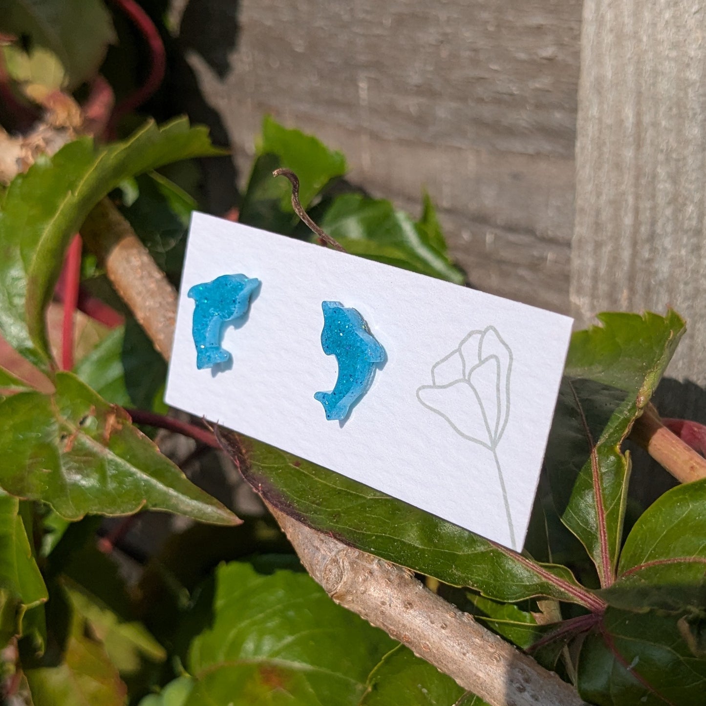 Dolphin stud earrings