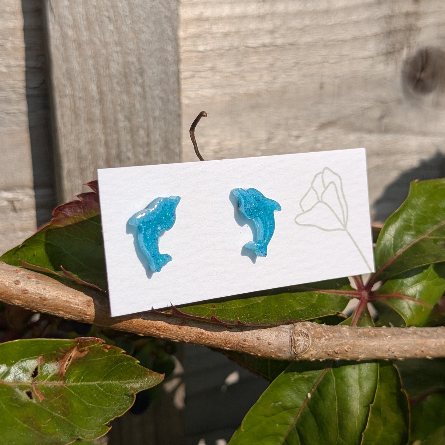 Dolphin stud earrings
