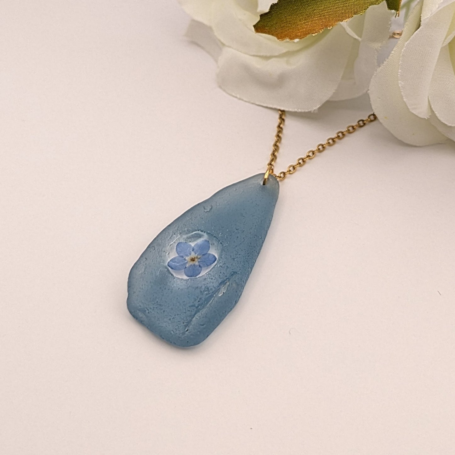 Forget me not and pale blue sea glass necklace