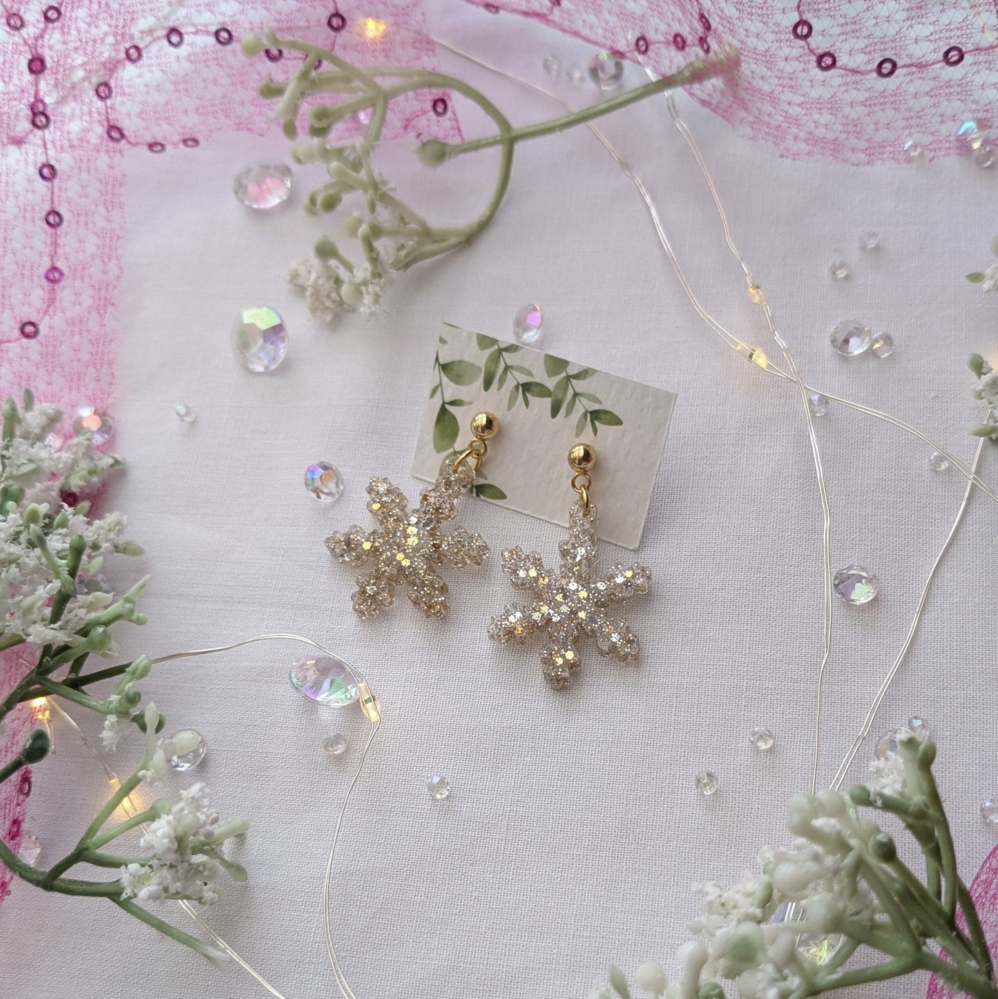 Golden snowflake earrings