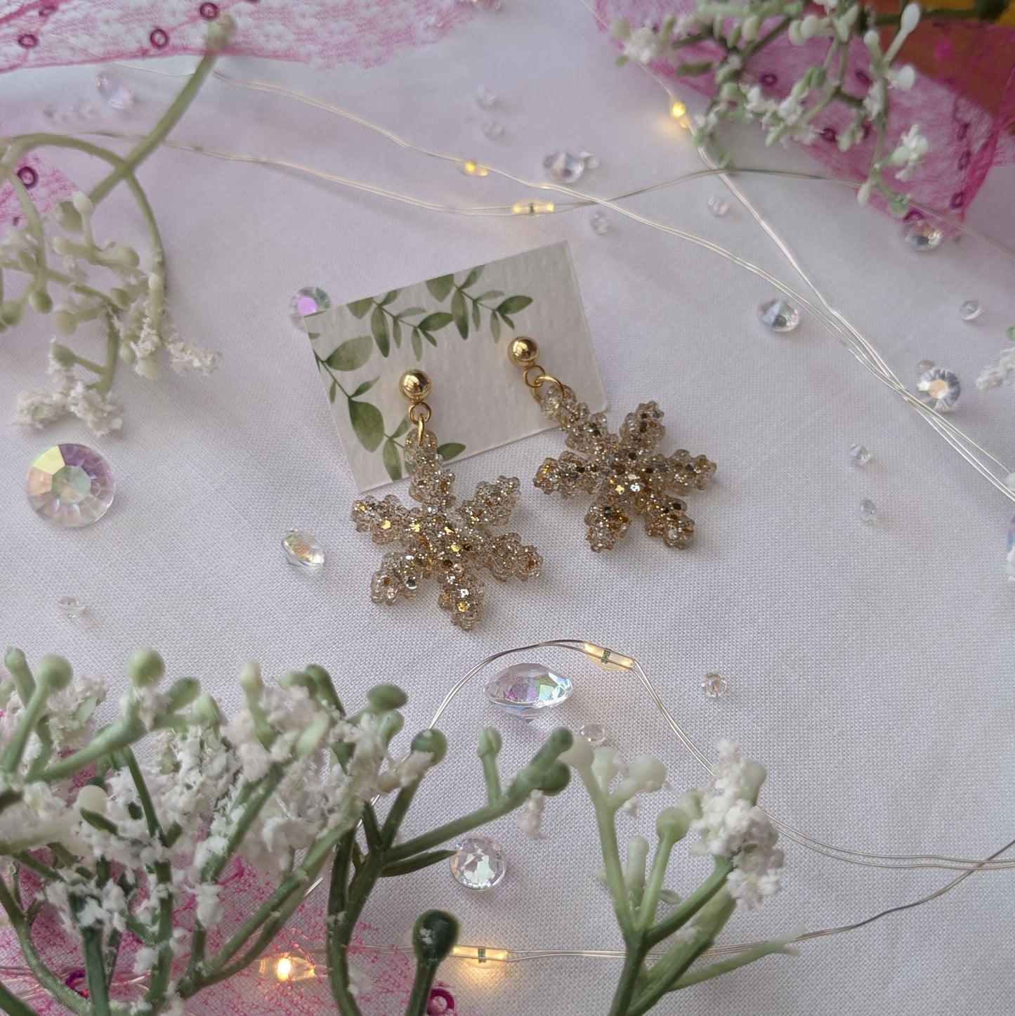 Golden snowflake earrings