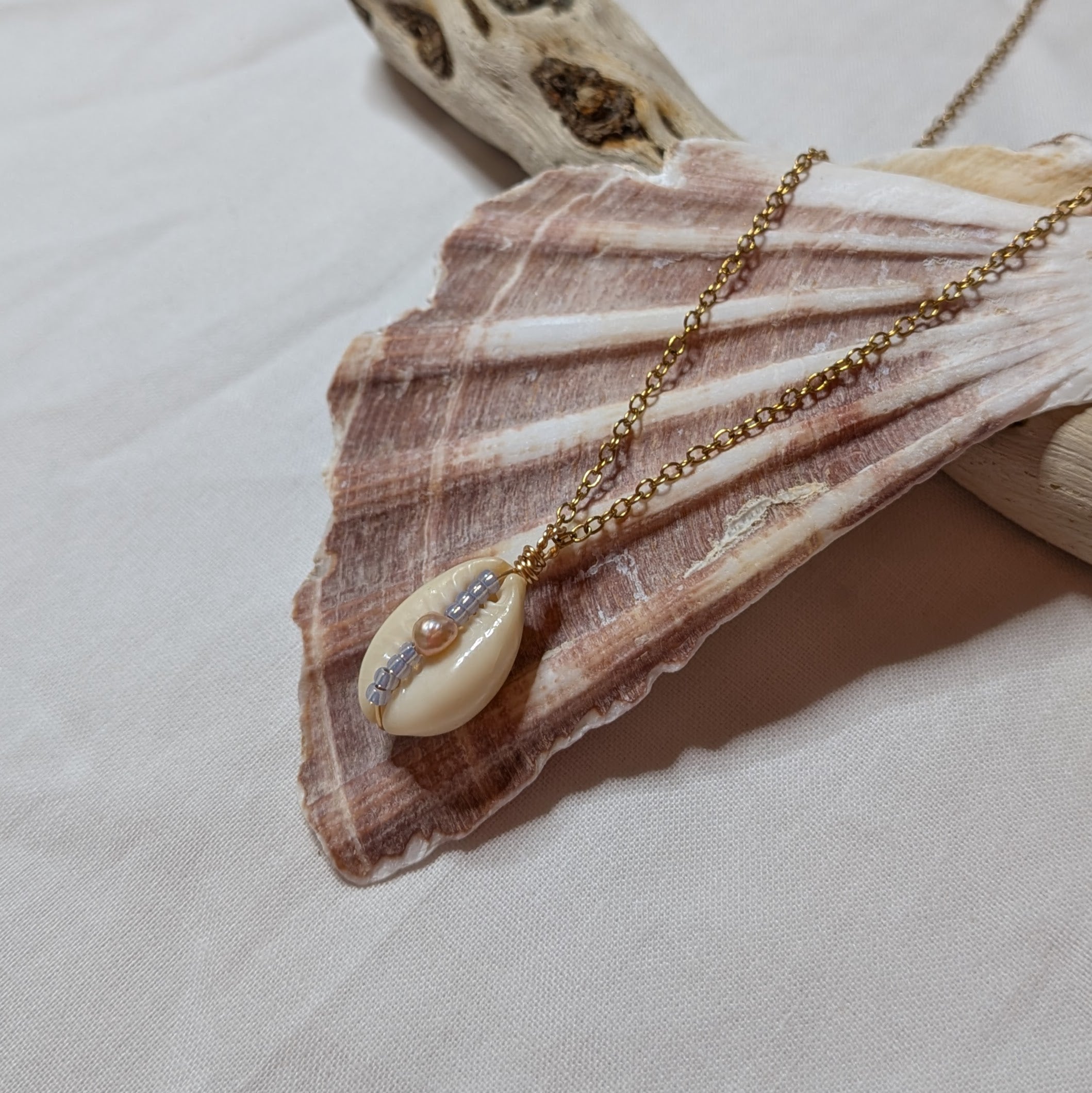 Cowrie shell and freshwater pearl necklace