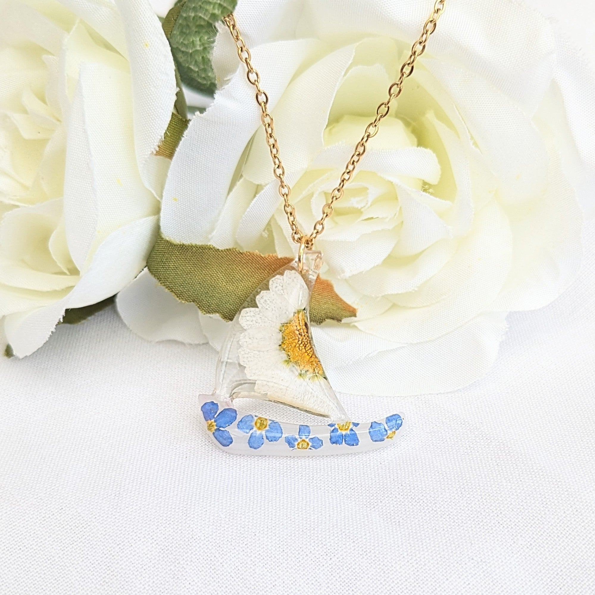 Floral sail boat necklace