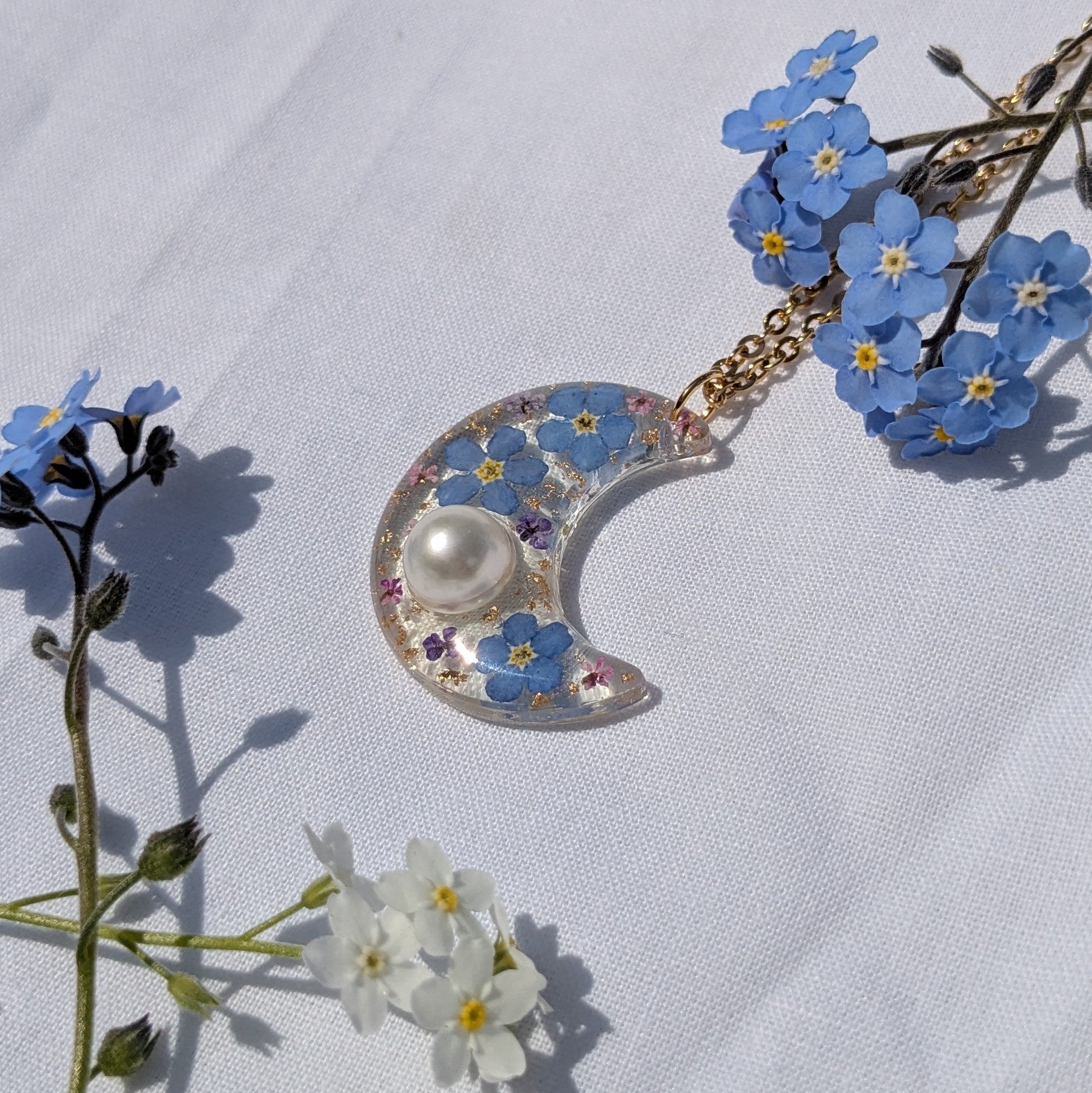 Pearl and forget me not moon necklace