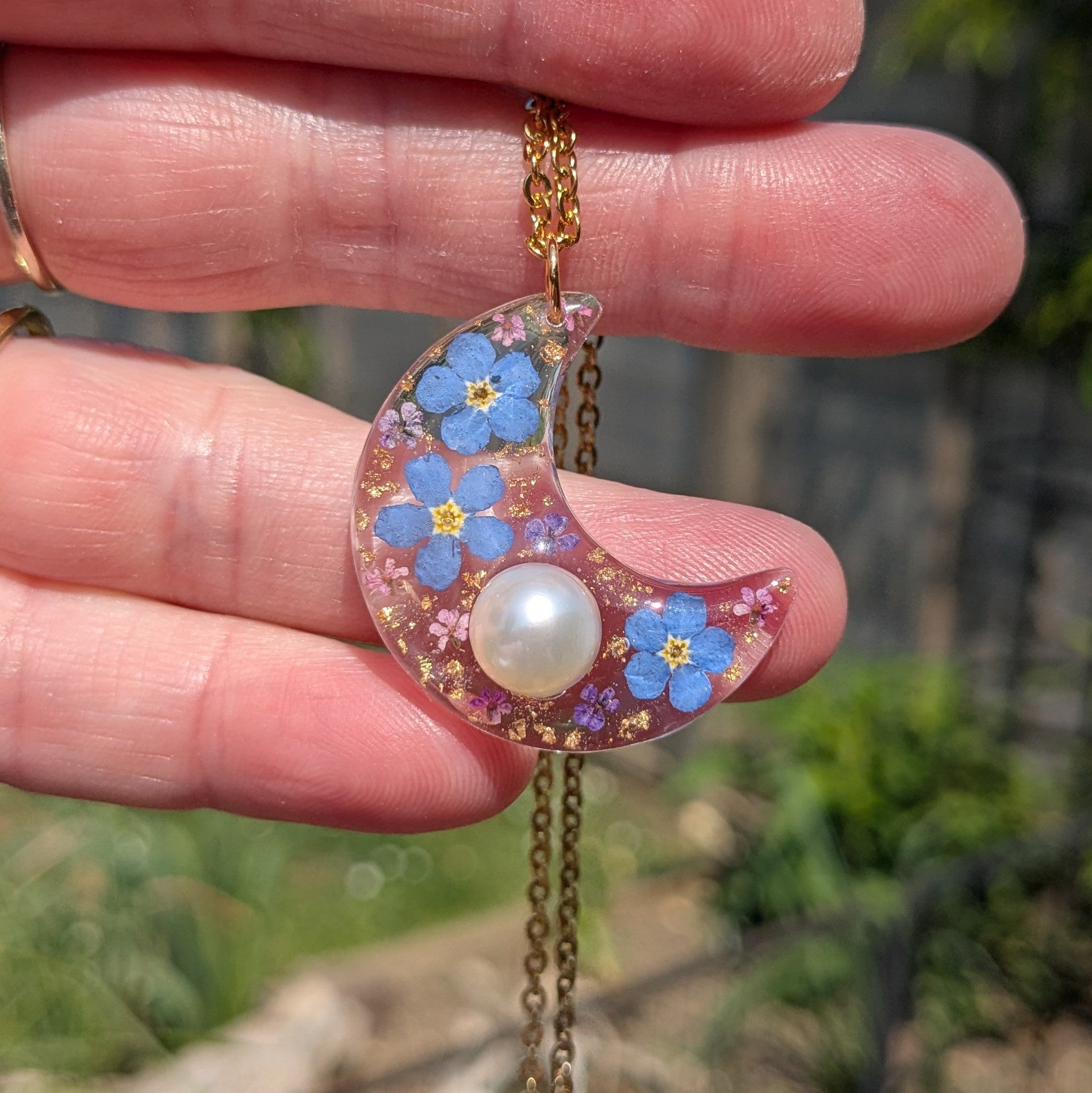 Pearl and forget me not moon necklace