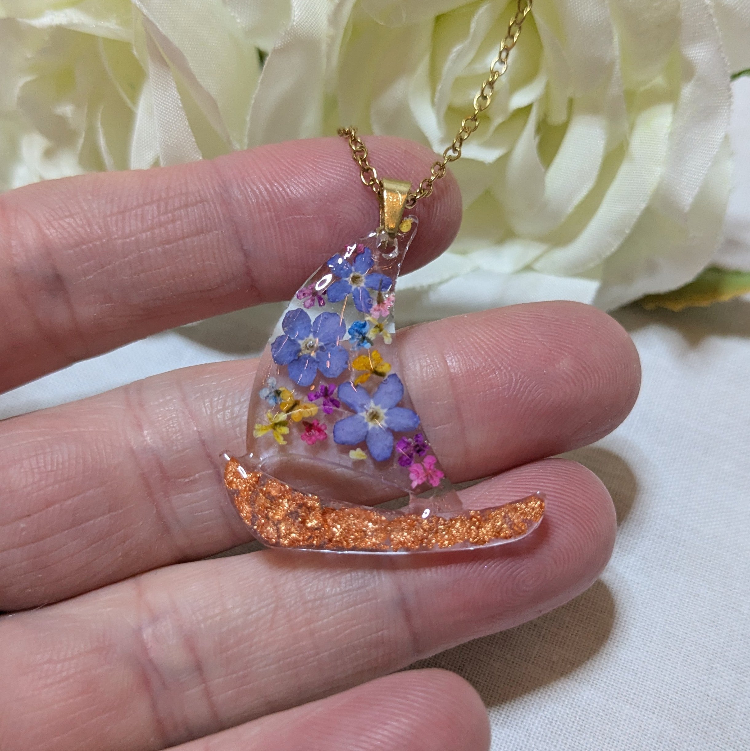 Floral sail boat necklace