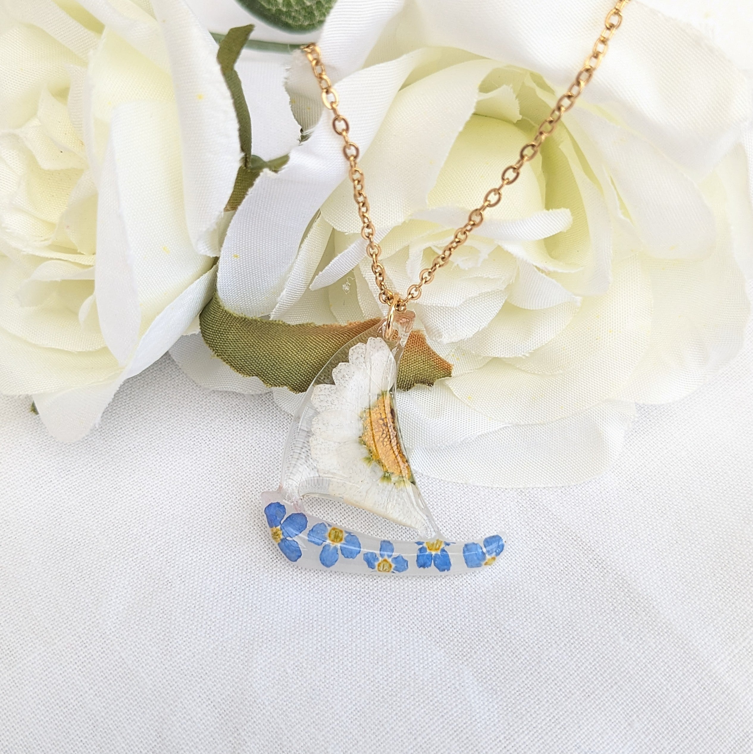 Floral sail boat necklace