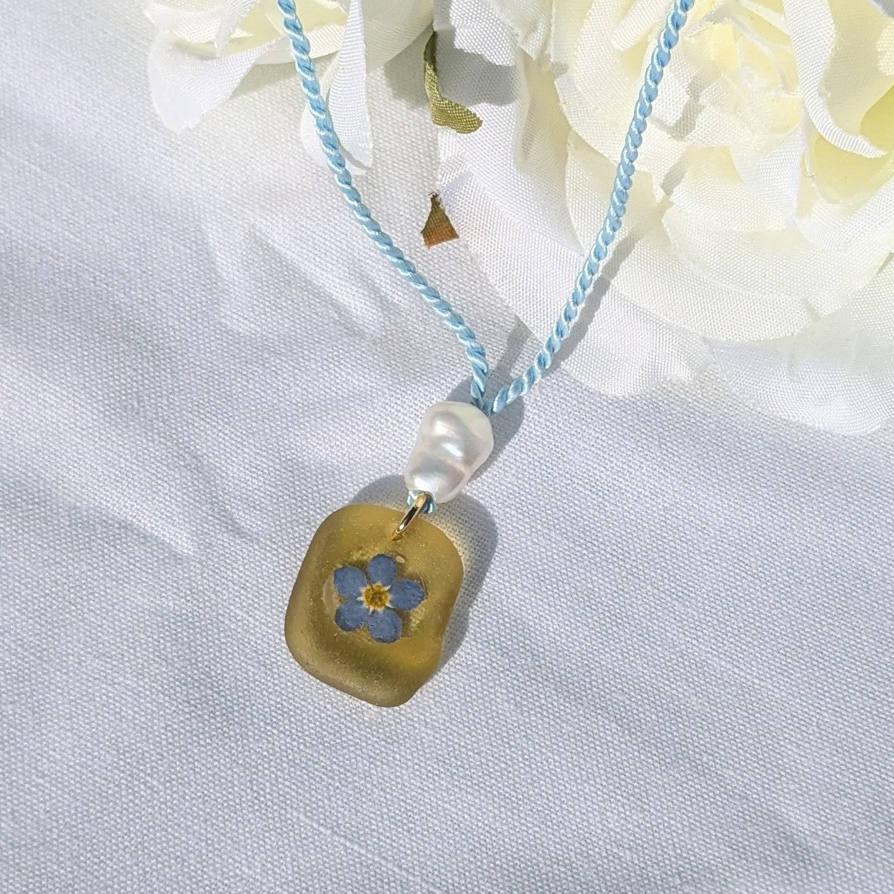 Yellow sea glass and forget me not necklace