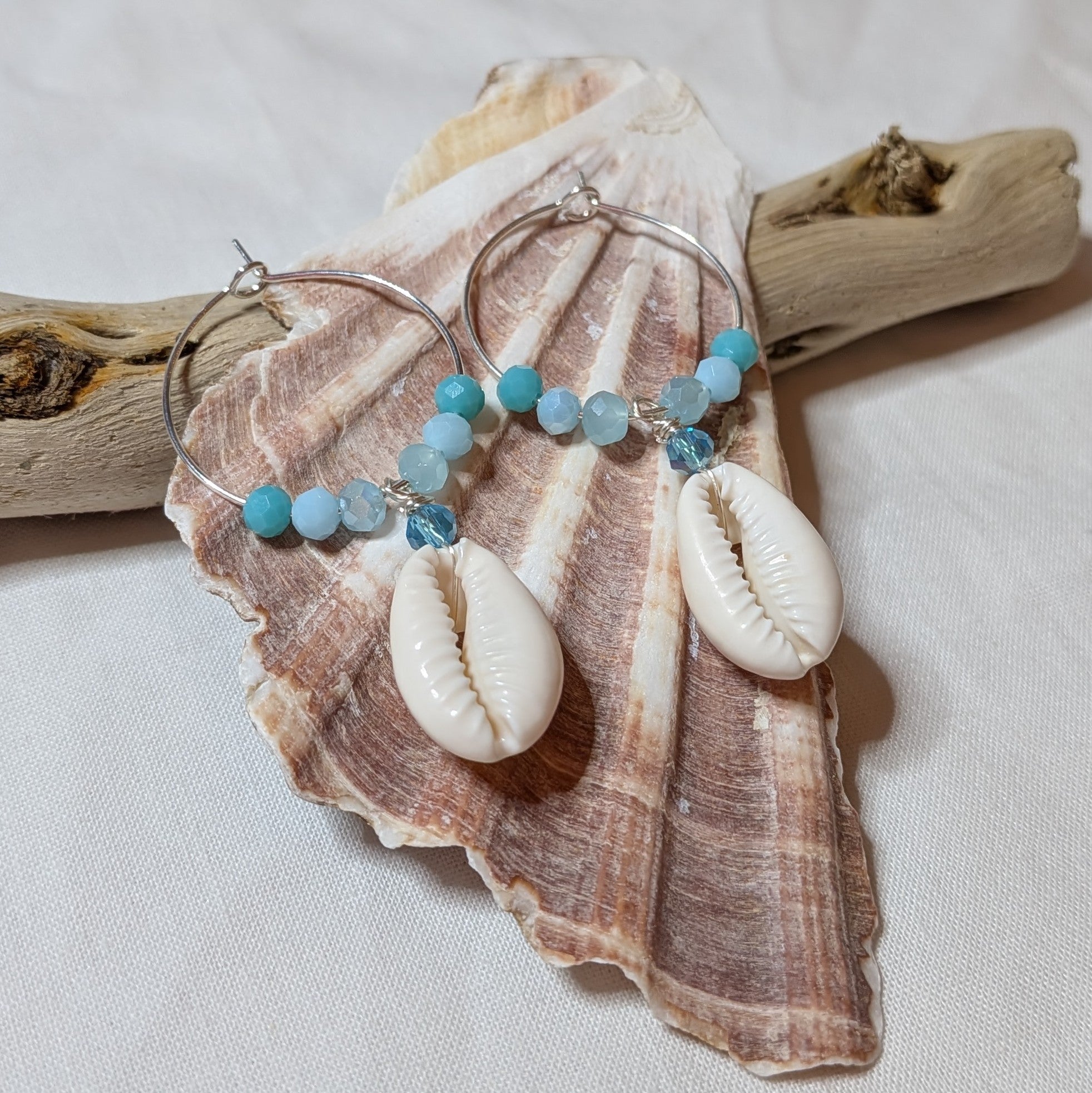 Large hoop cowrie shell earrings