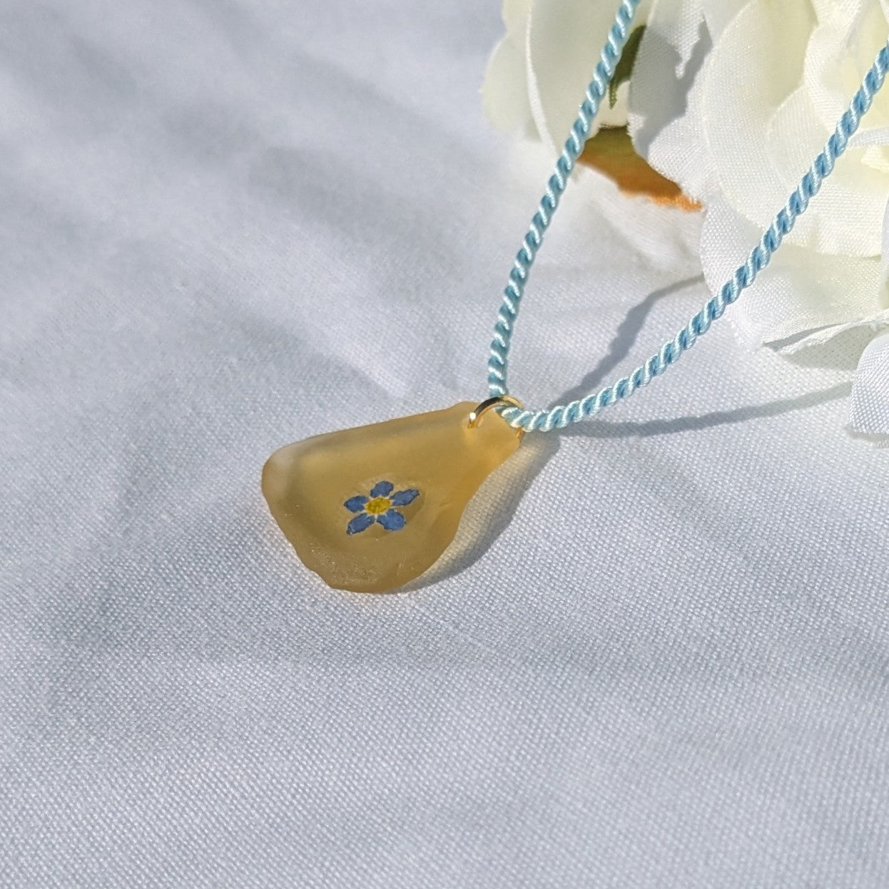 Pale yellow sea glass and forget me not necklace