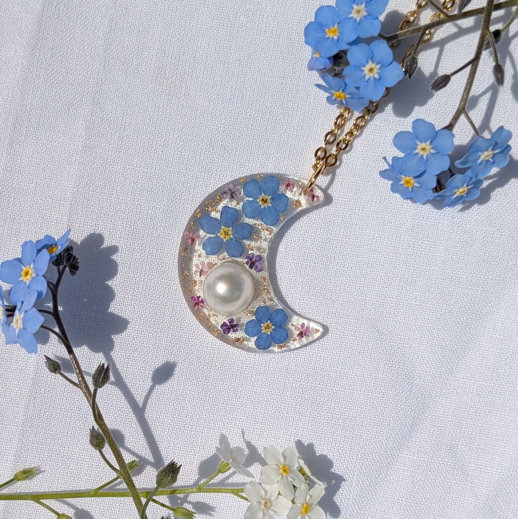 Pearl and forget me not moon necklace