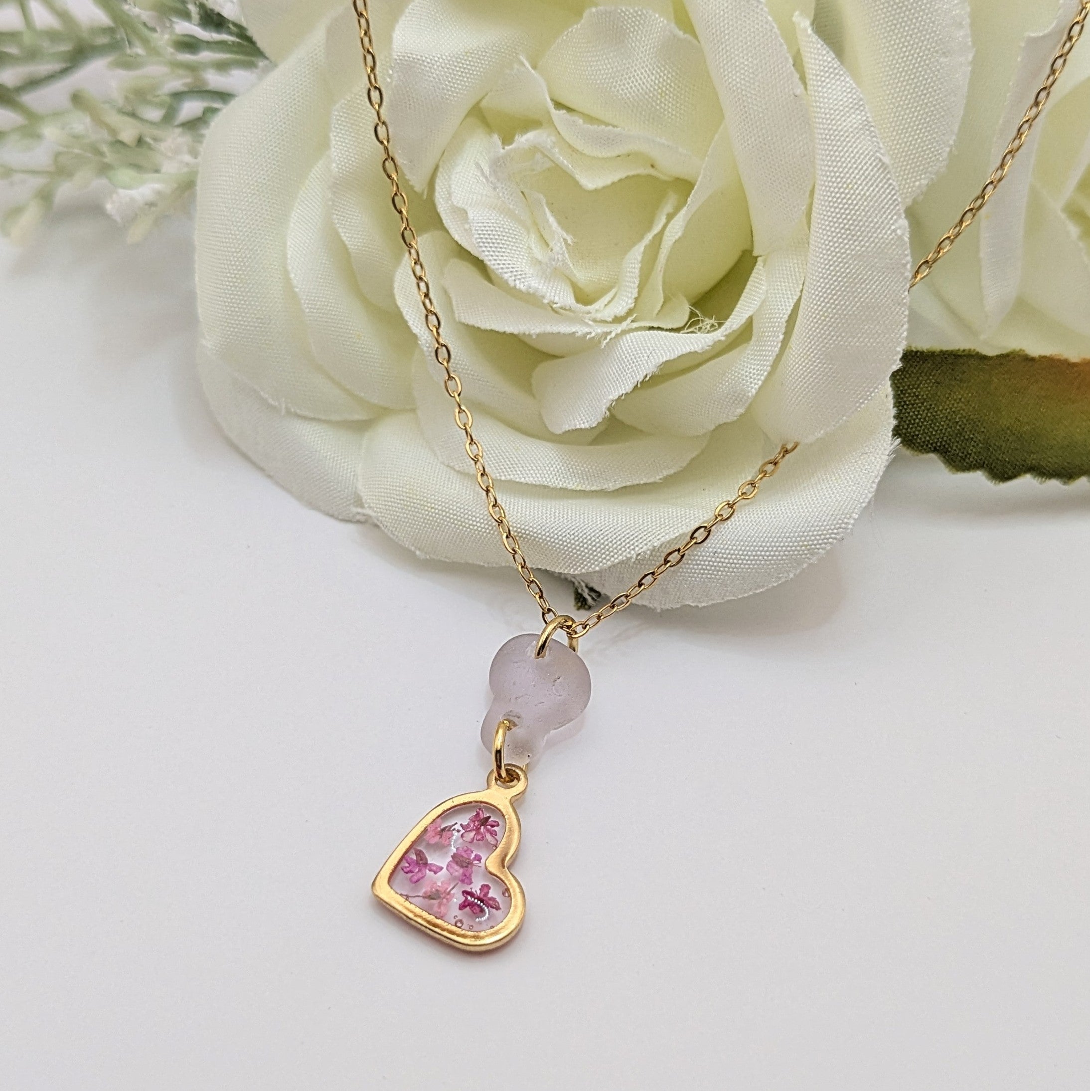 Pale pink sea glass and flower heart necklace