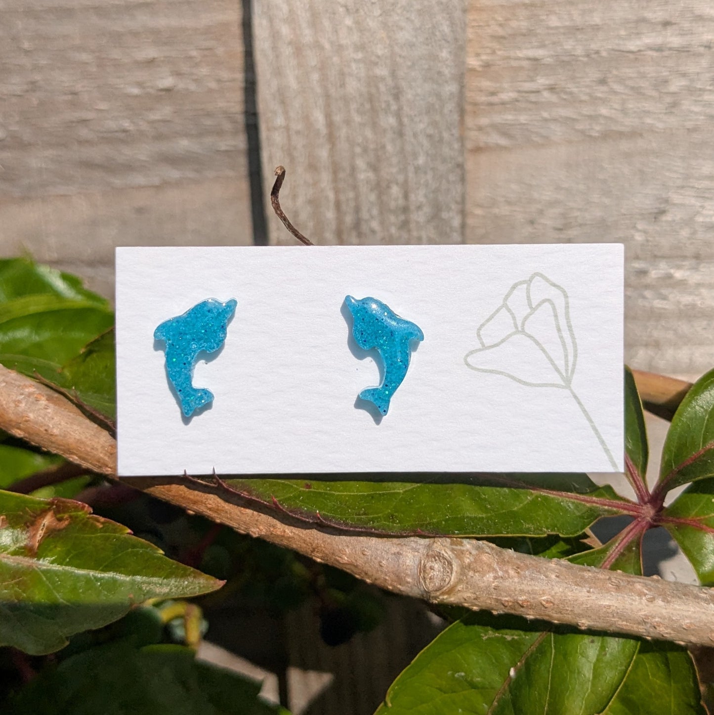 Dolphin stud earrings