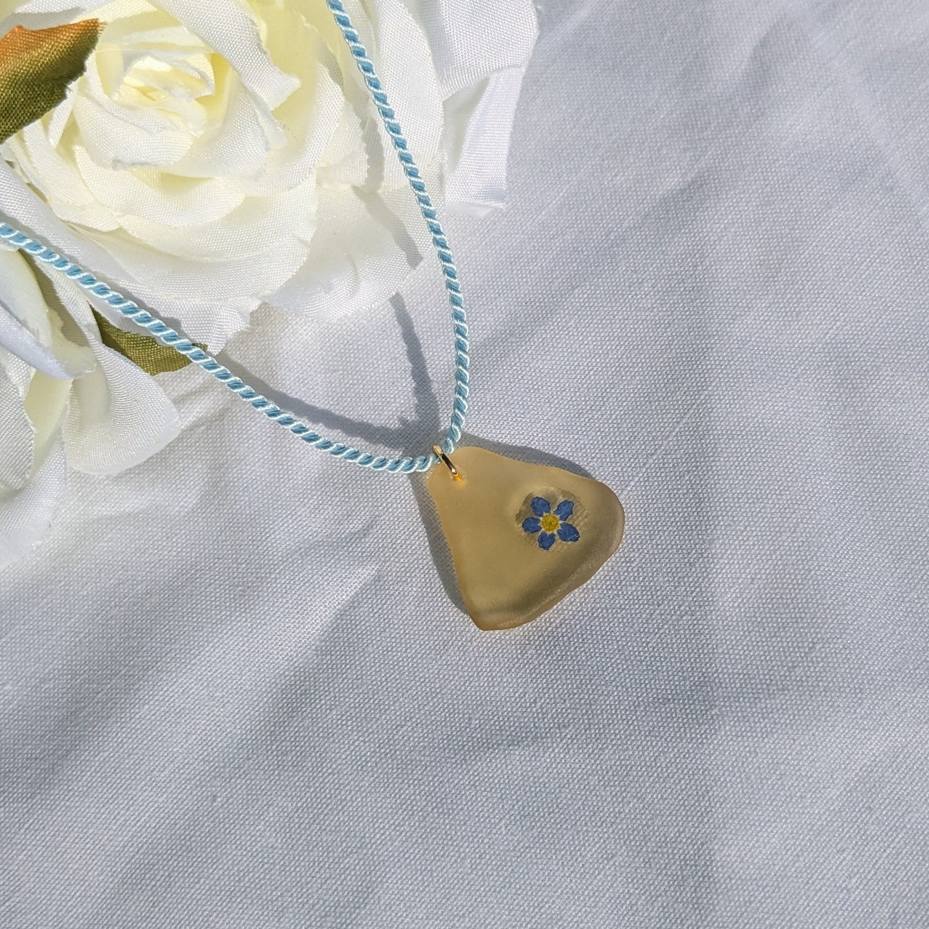 Pale yellow sea glass and forget me not necklace