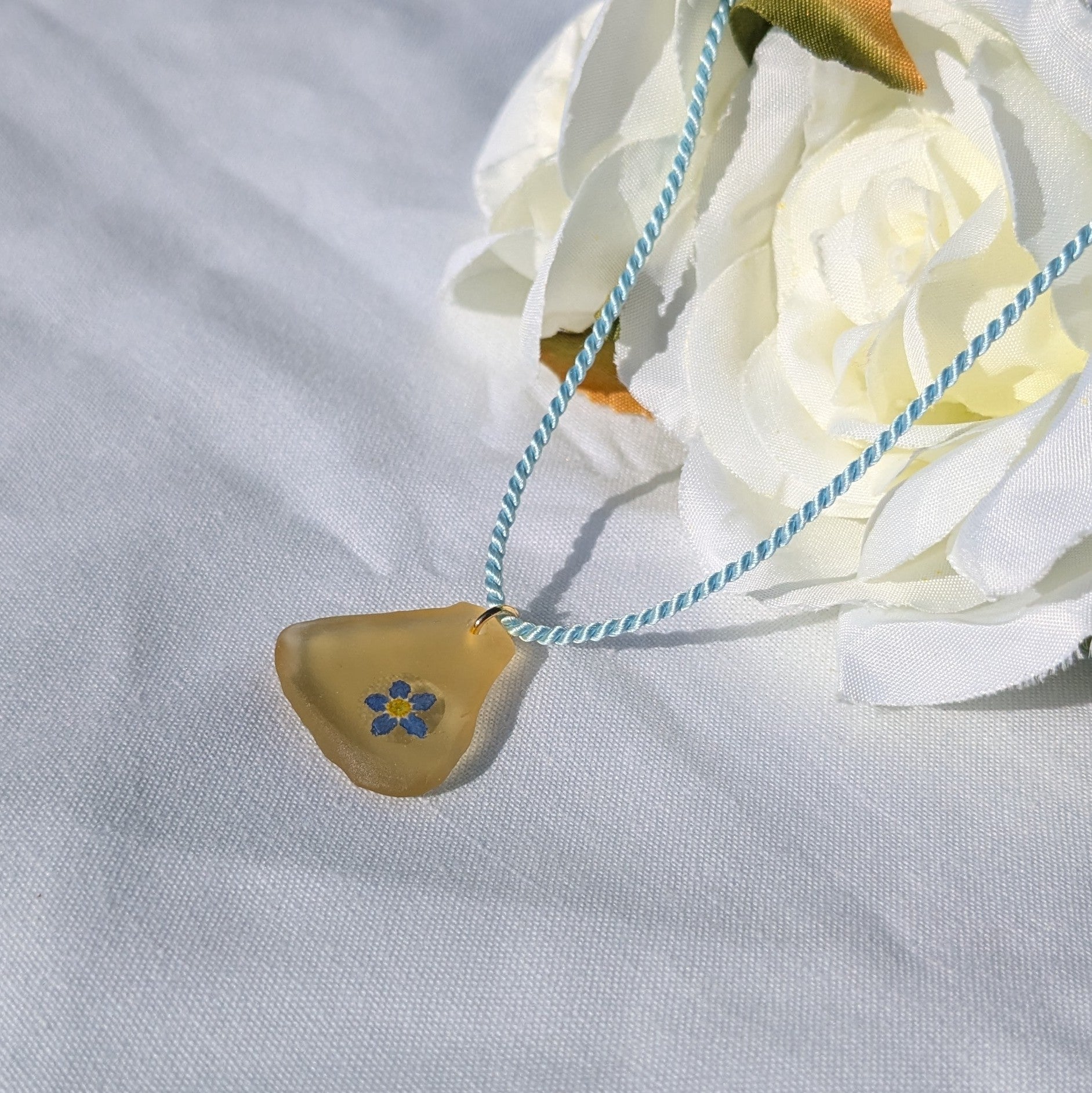 Pale yellow sea glass and forget me not necklace