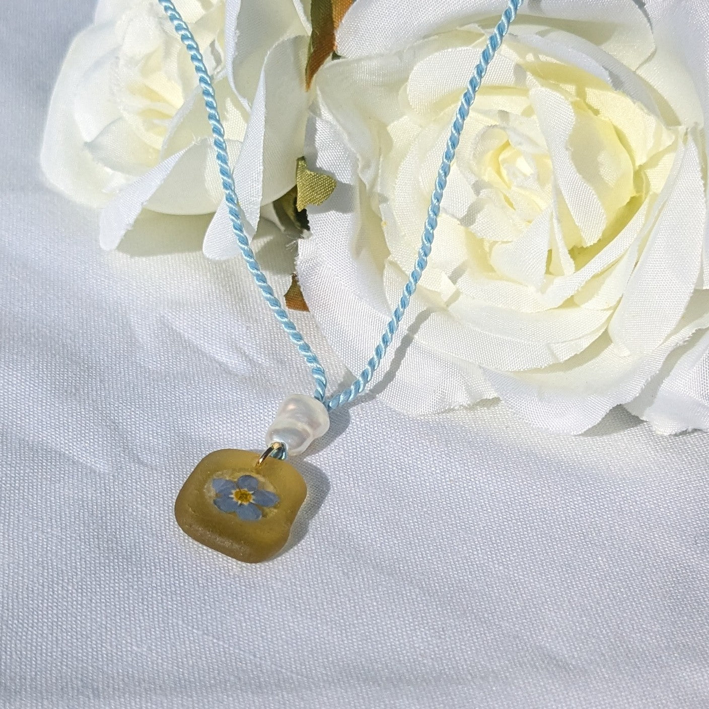 Yellow sea glass and forget me not necklace