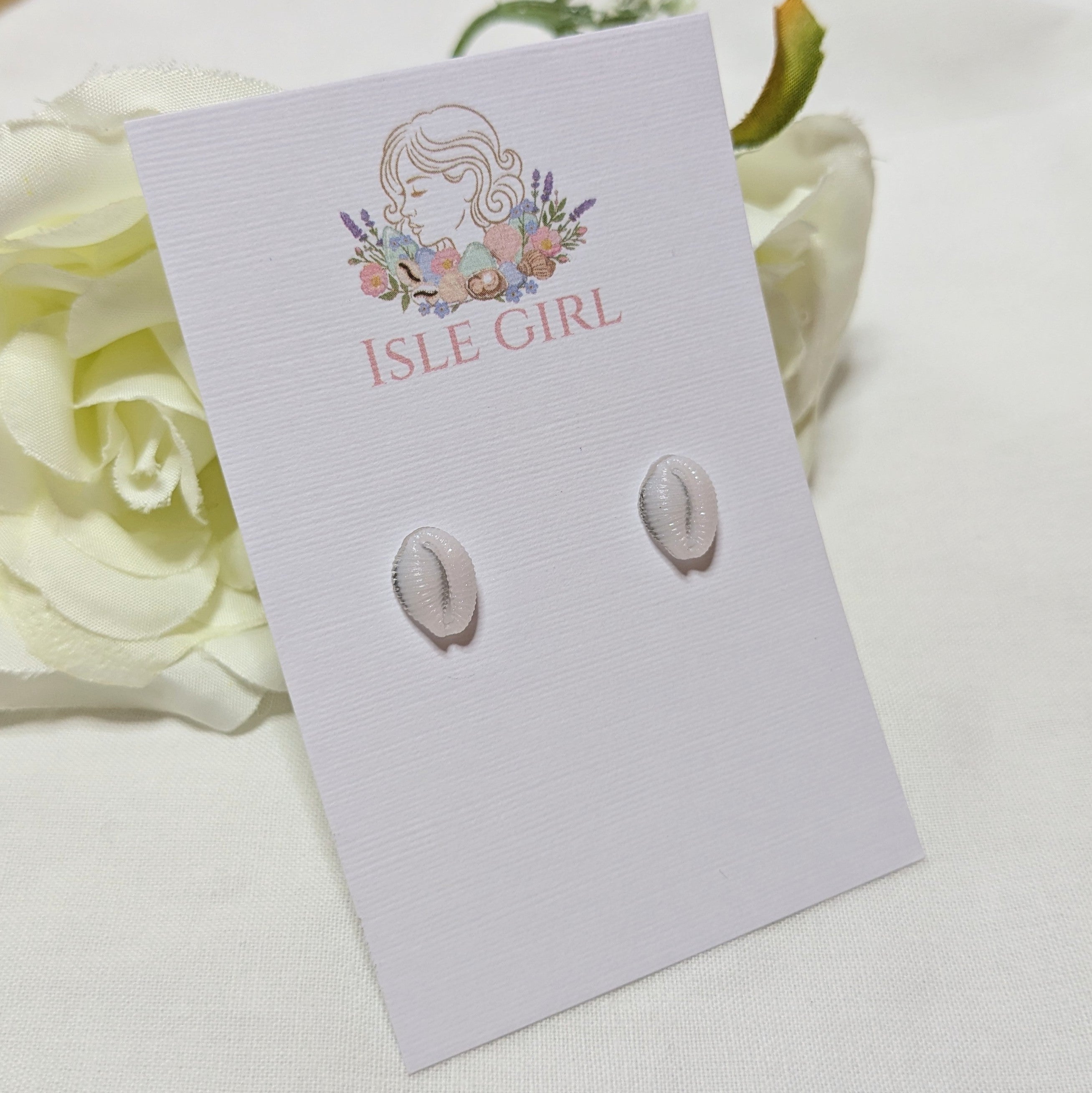 Resin cowrie shell stud earrings