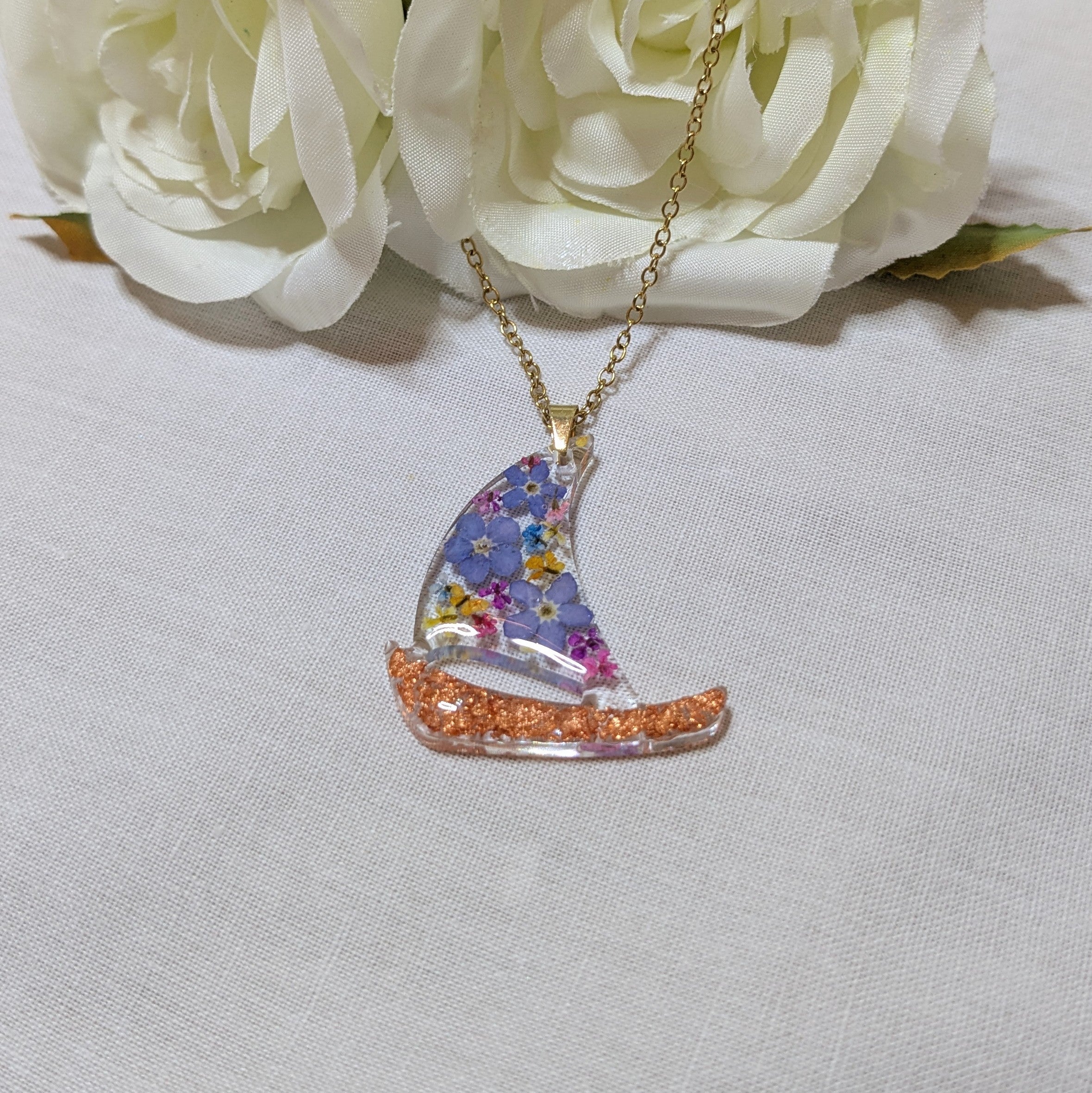 Floral sail boat necklace