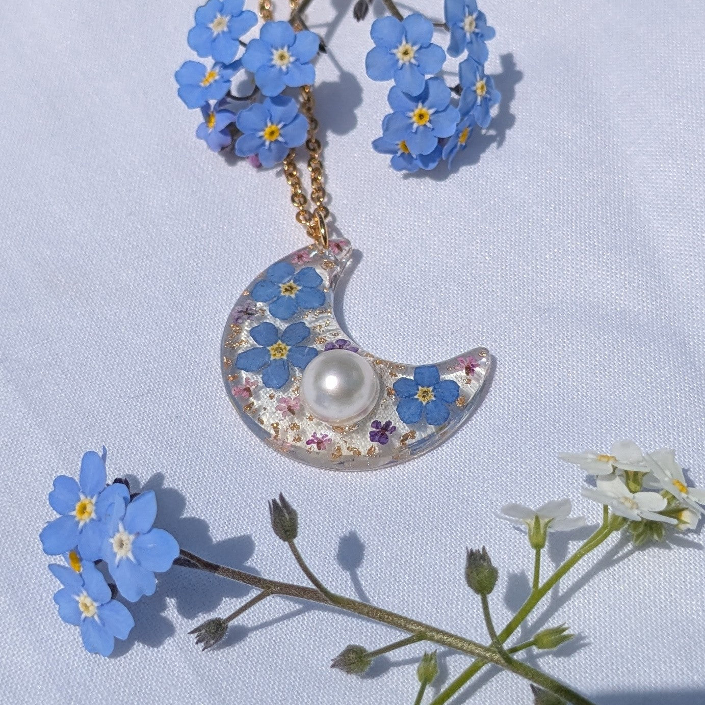 Pearl and forget me not moon necklace