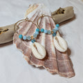 Large hoop cowrie shell earrings