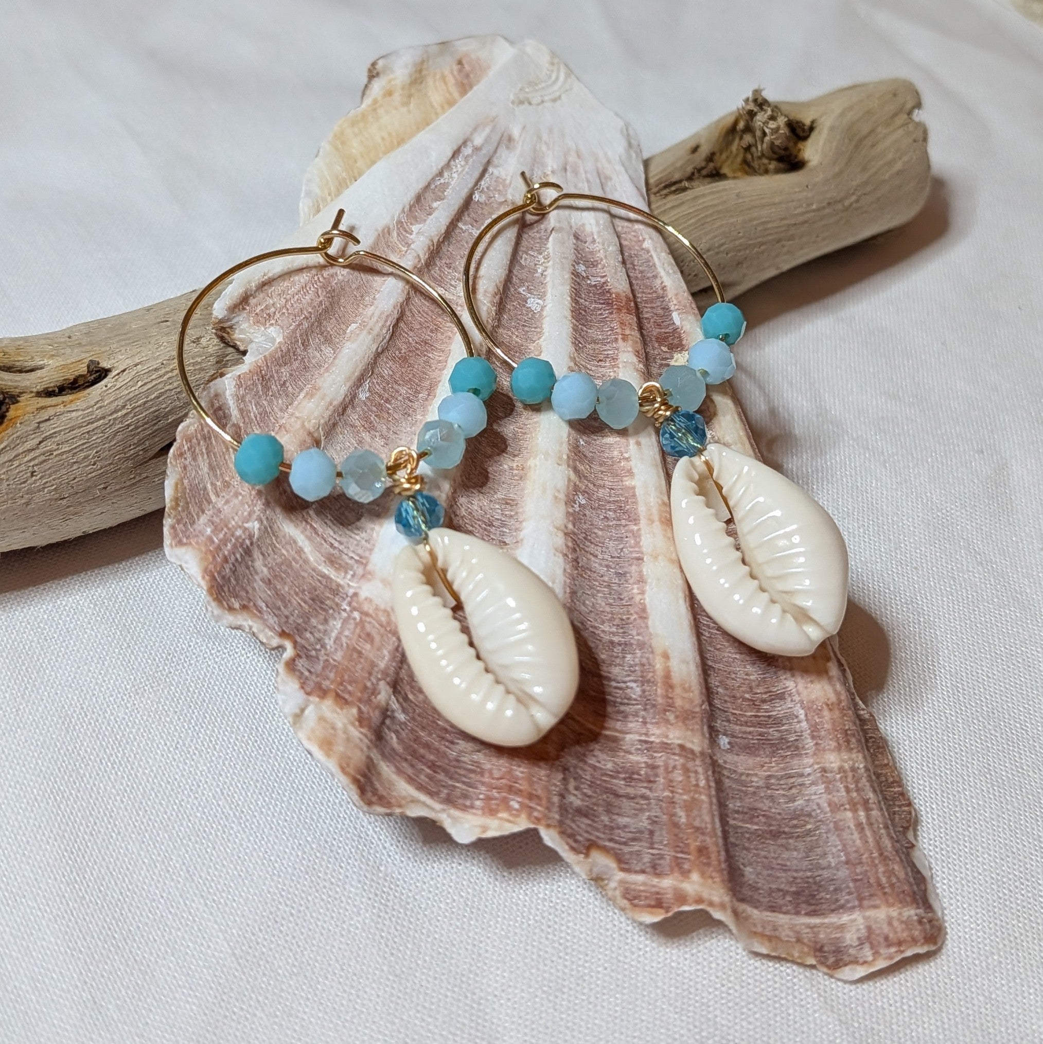 Large hoop cowrie shell earrings