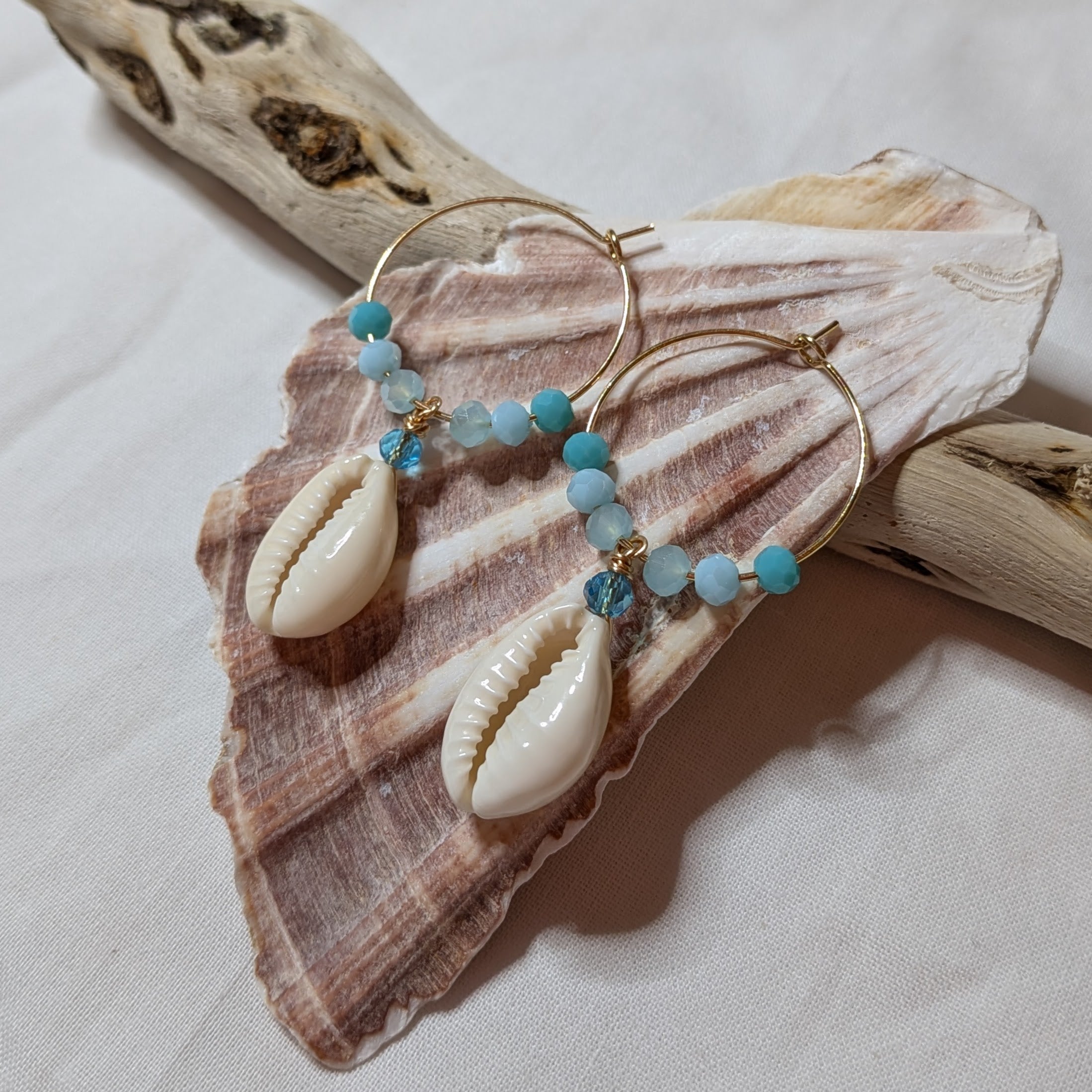 Large hoop cowrie shell earrings