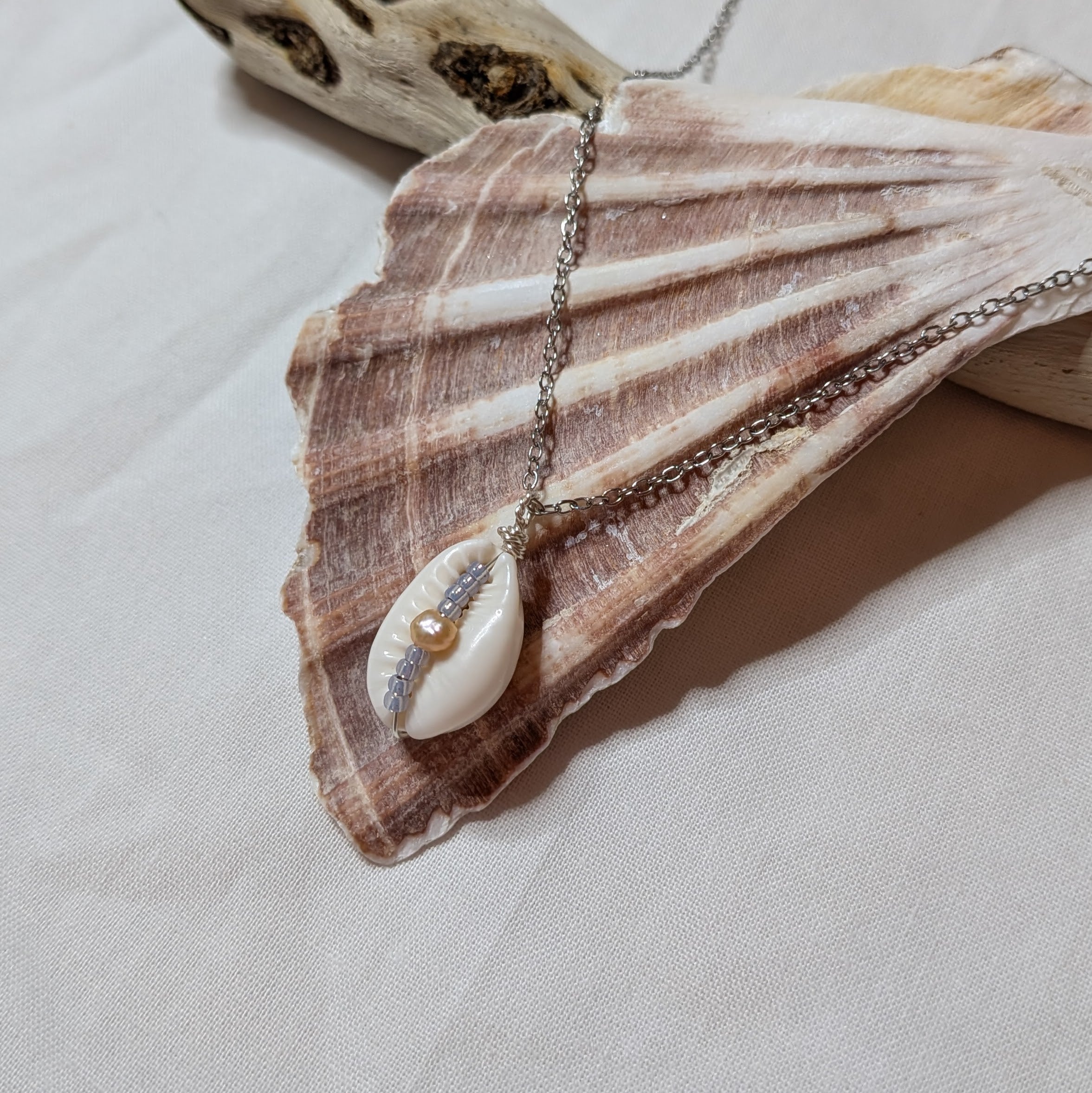 Cowrie shell and freshwater pearl necklace