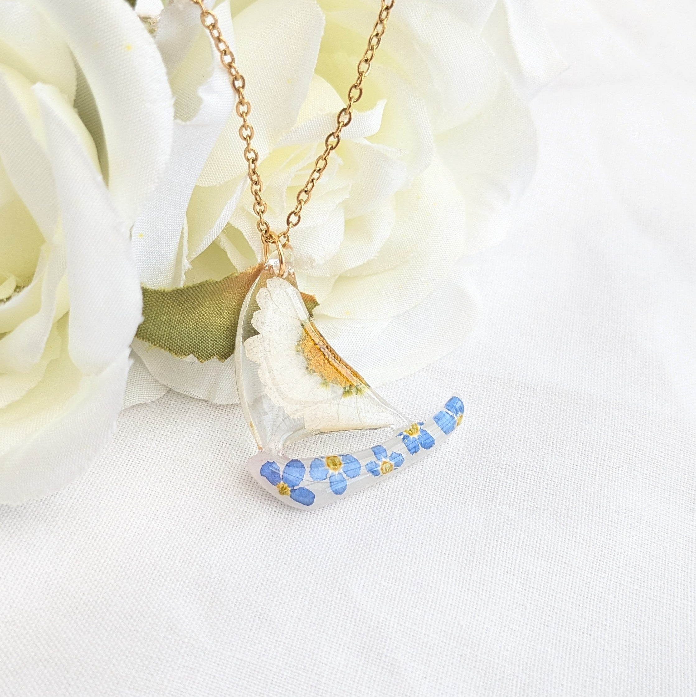 Floral sail boat necklace