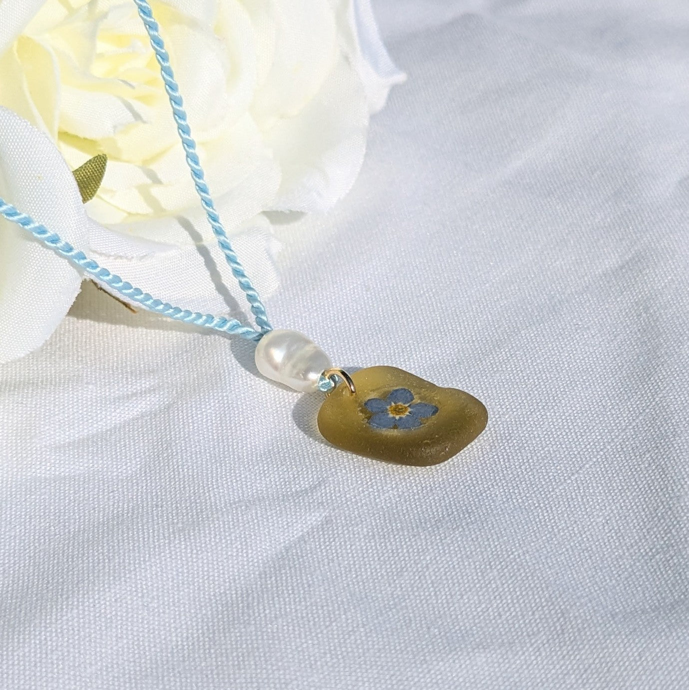 Yellow sea glass and forget me not necklace