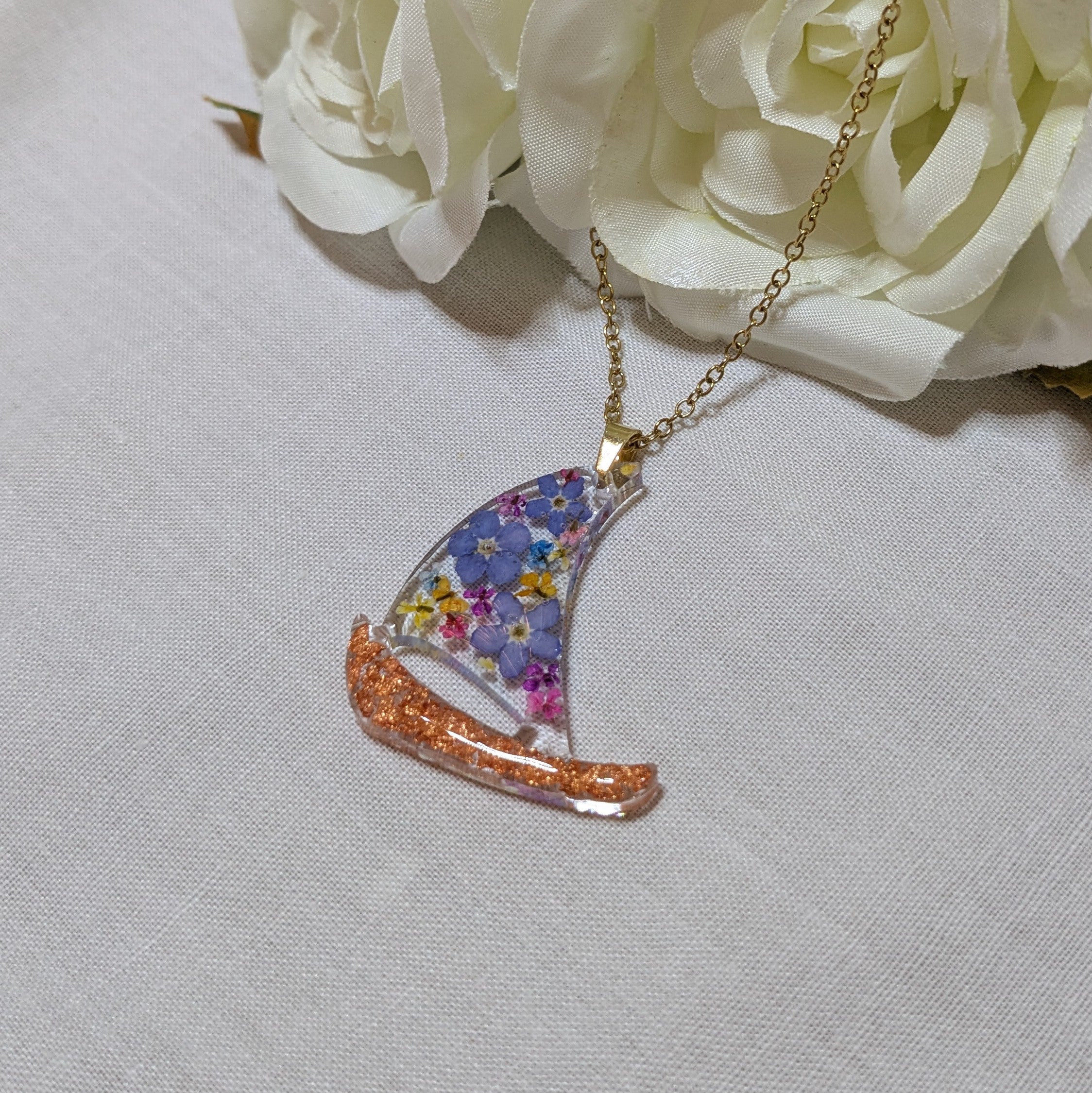 Floral sail boat necklace